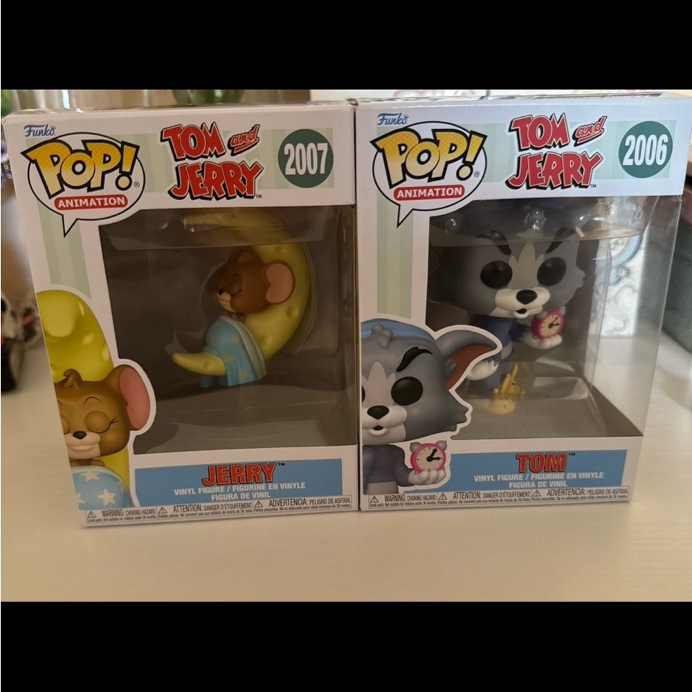 Funko Tom and Jerry Vinyl Figures with Yellow and Gray Accents